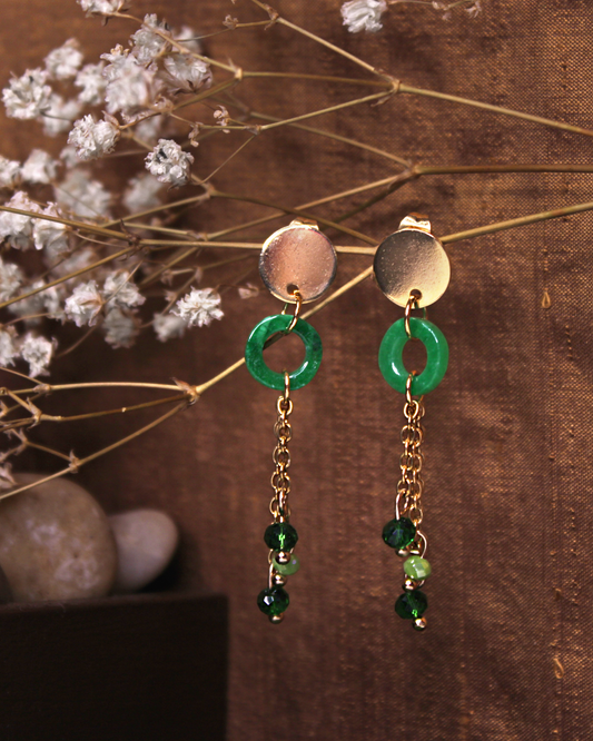 Gold plated stainless steel earring studs with dainty circle jade beads and dangling chain with faceted green crystal beads. 